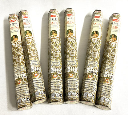 Six packages of Hem Incense sticks Jasmine  on a white background
