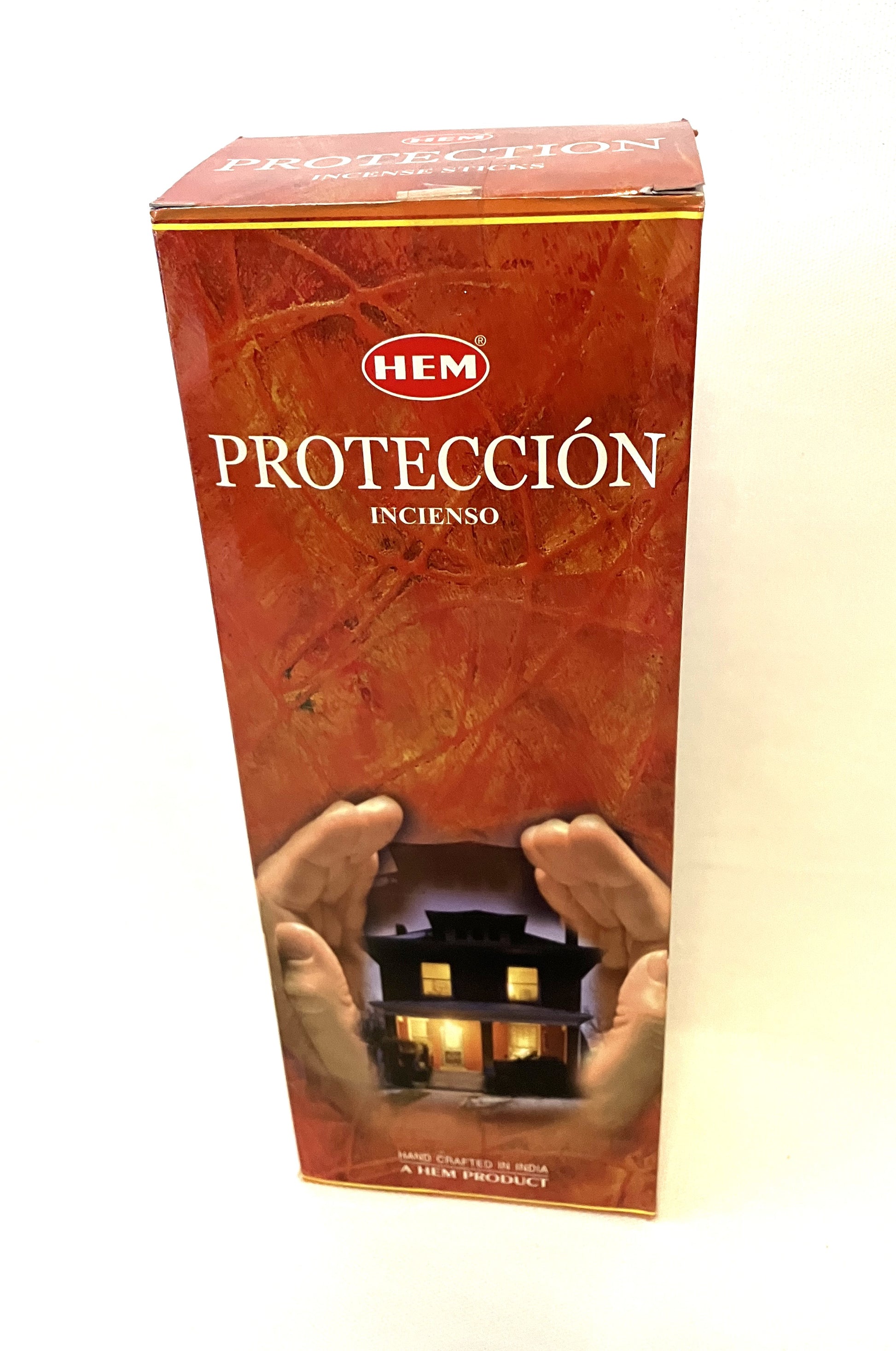 Box of HEM Proteccion Incense with a house illustration on a white background