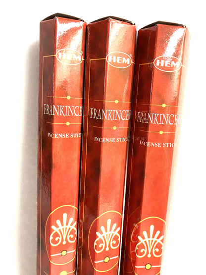 Three boxes of HEM Frankincense Incense Sticks on a white background