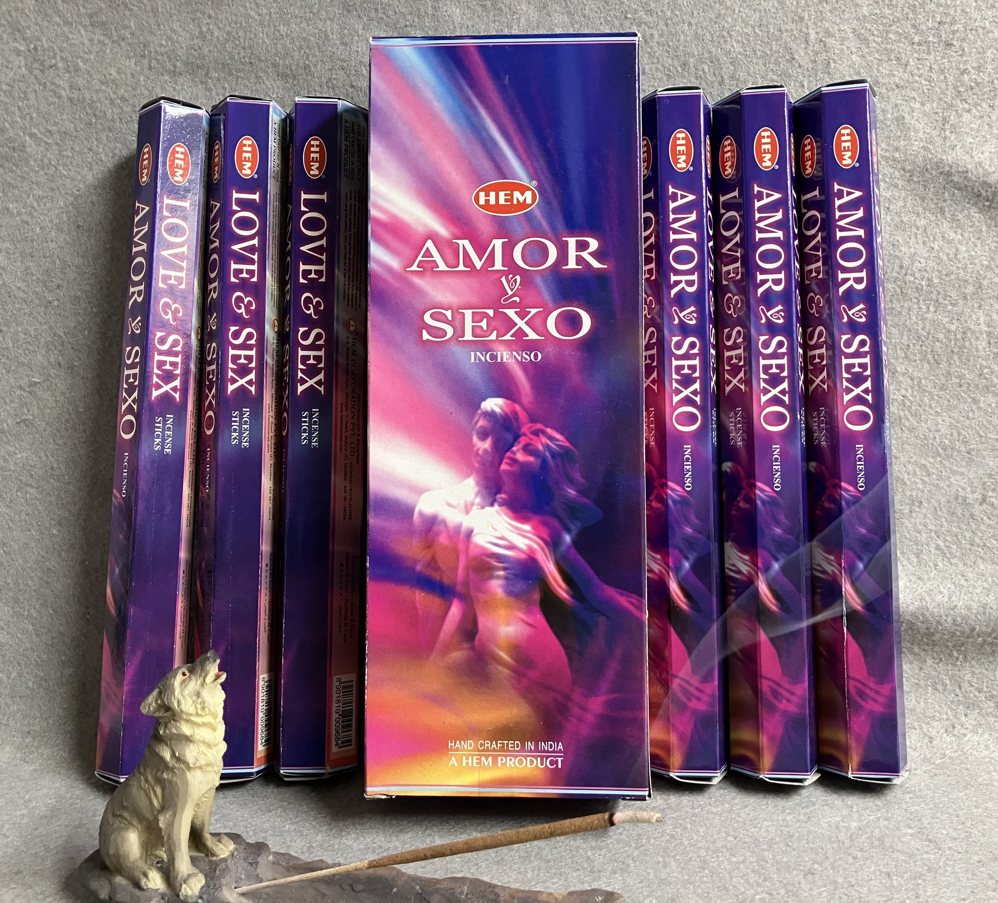 HEM Love and Sex incense packaging with multiple boxes on a gray background