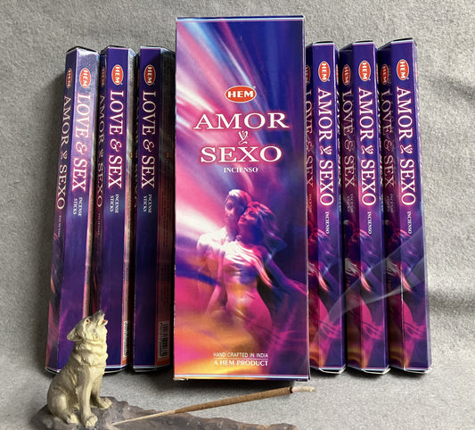 HEM Love and Sex incense packaging with multiple boxes on a gray background