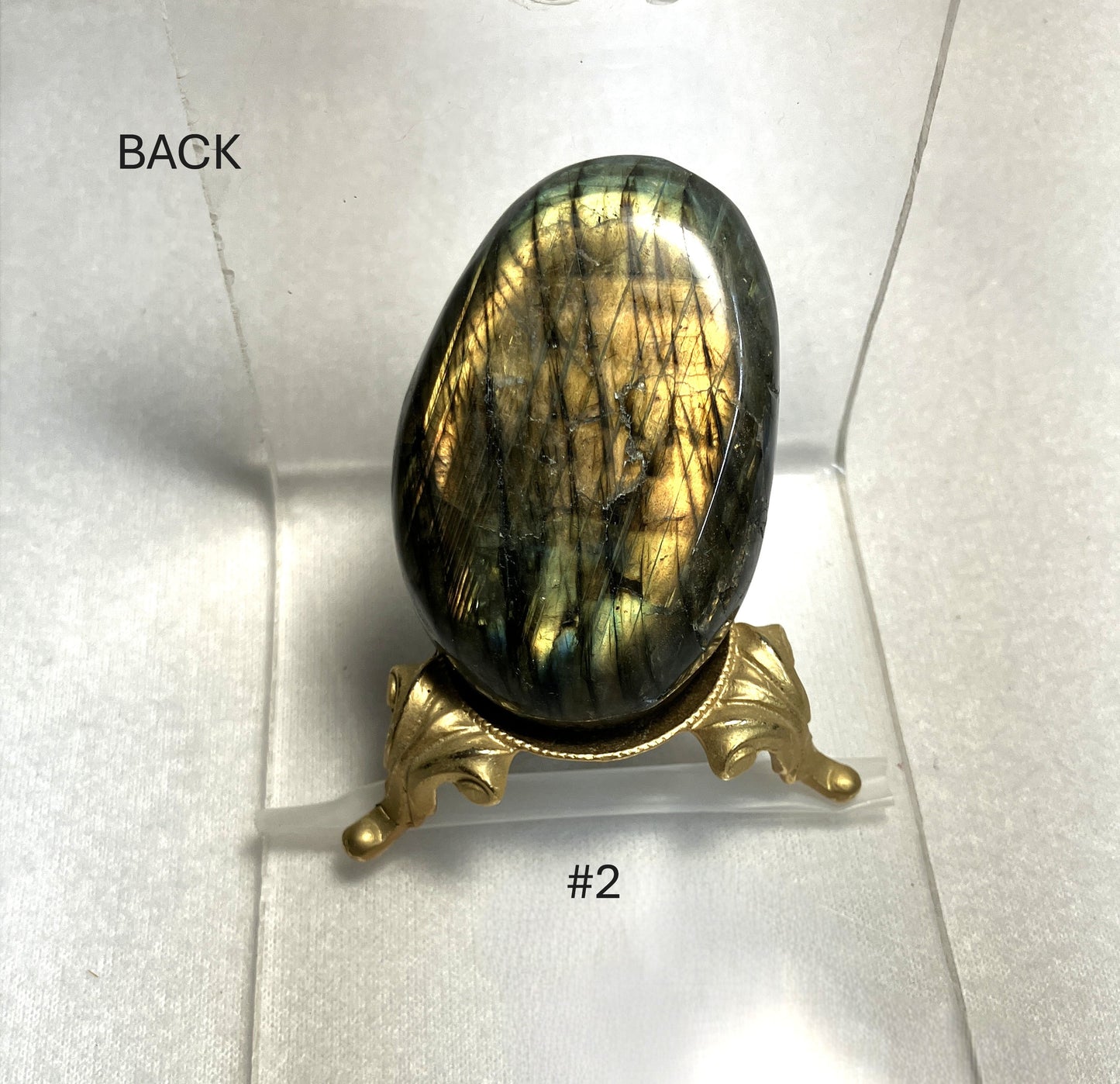 Labradorite stone on a decorative stand with 'BACK' and '#2' text on a white background