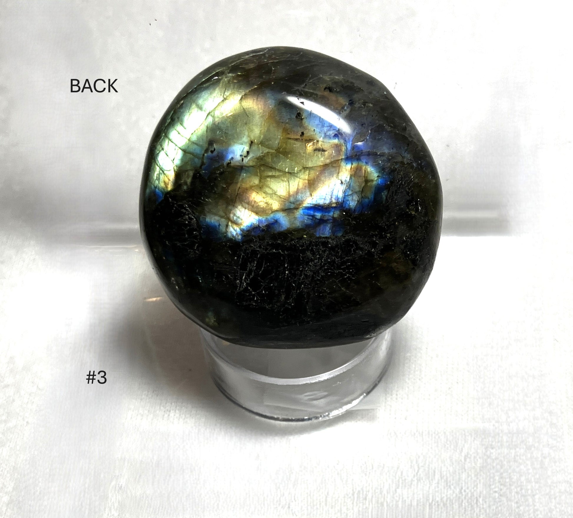 Labradorite stone with metallic base on a white background labeled Back #3