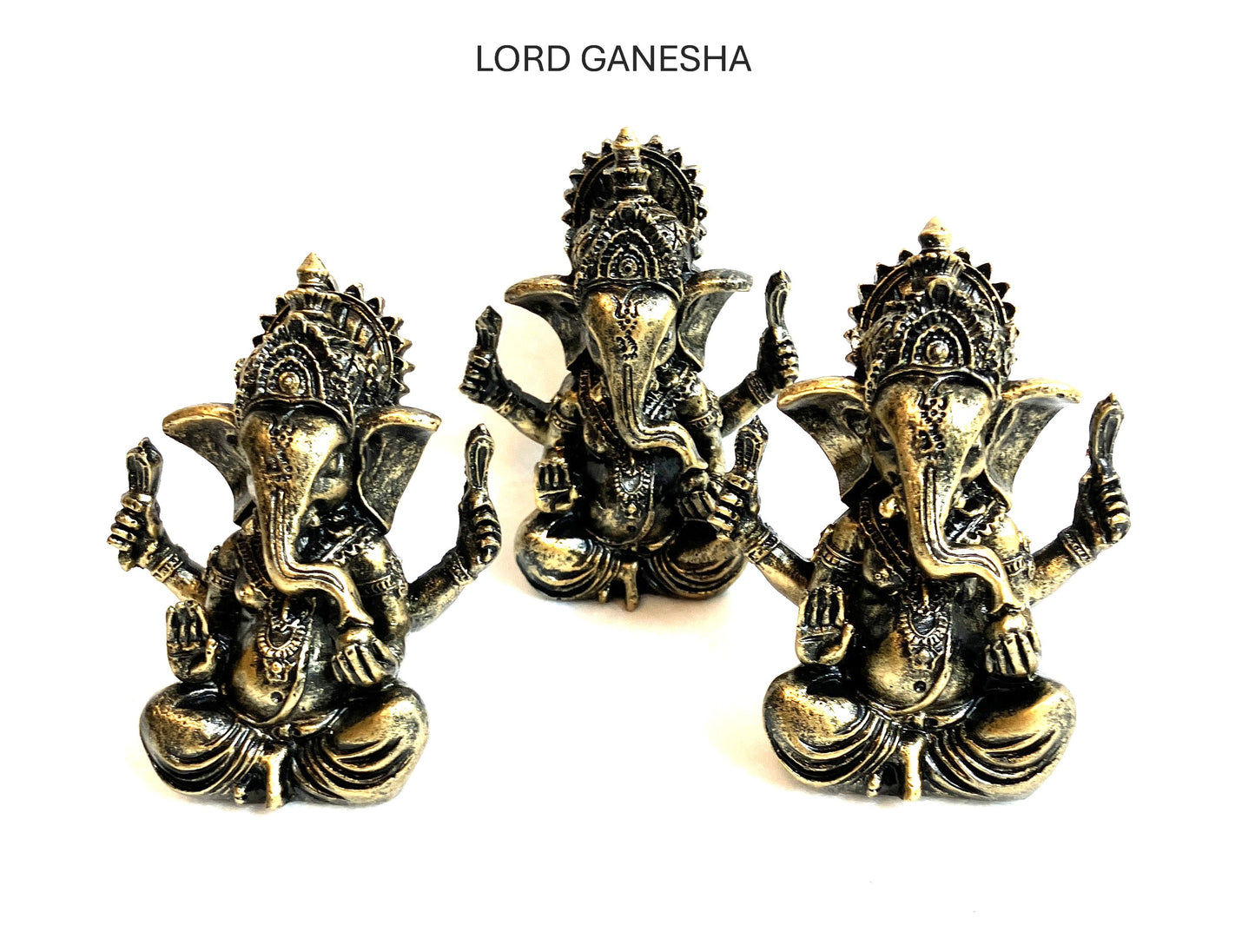 Group of three Lord Ganesha statues front side shown on a white background
