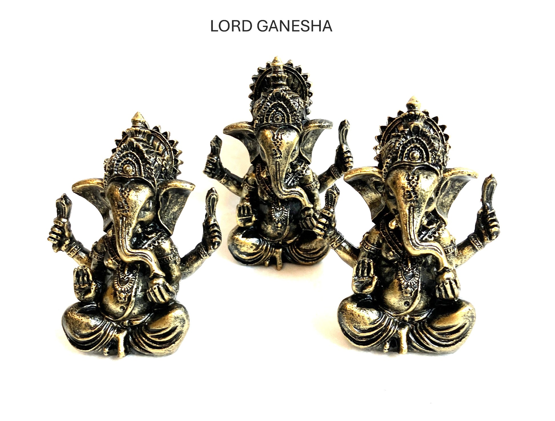 Group of three Lord Ganesha statues front side shown on a white background