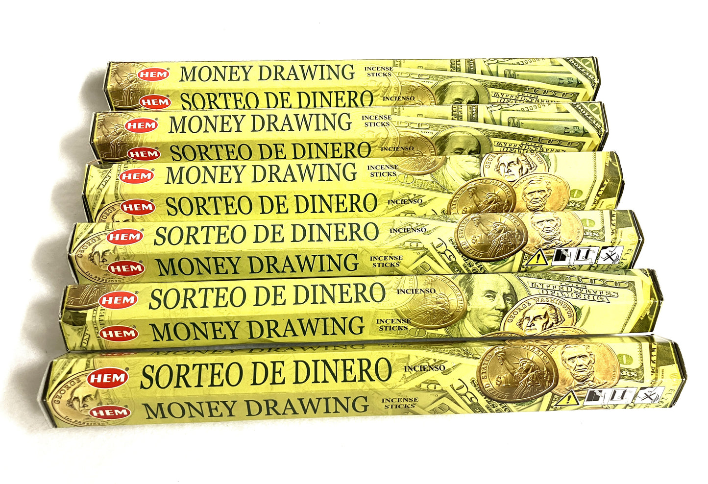 Multiple packages of HEM money drawing incense sticks shown in both English and Spanish  on a white background