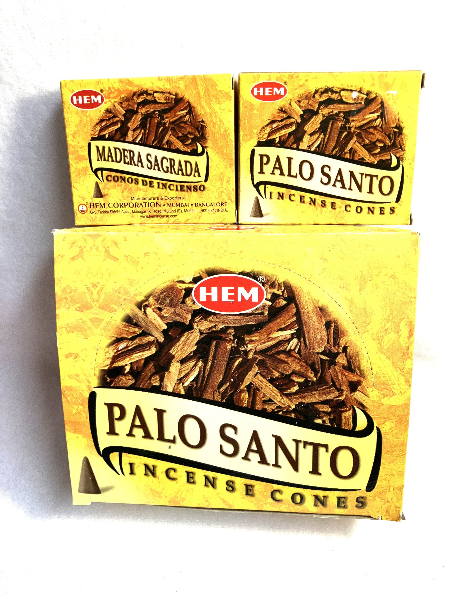 Master carton and two boxes of Hem Palo Santo incense cones shown on a white background
