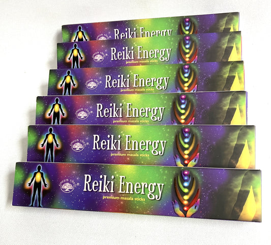 Stack of Reiki Energy incense stick boxes shown on a white background
