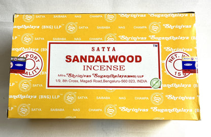 Box of Satya Sandalwood Incense with branding and product details.