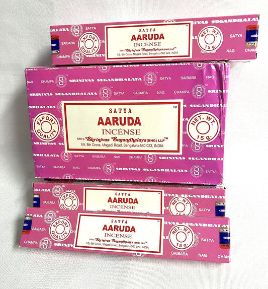 Three boxes of Satya Aaruda incense on a white background