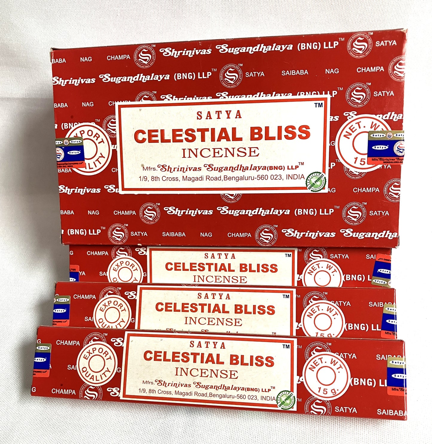Multiple boxes of Satya Celestial Bliss Incense stacked on a white background