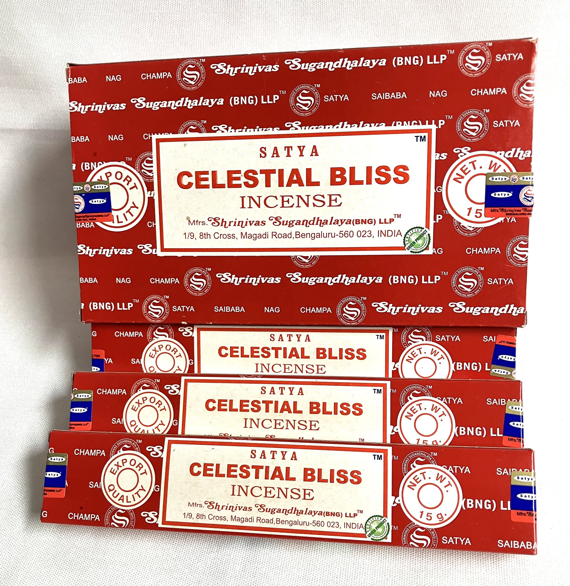 Multiple boxes of Satya Celestial Bliss Incense stacked on a white background