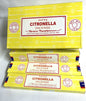 Yellow boxes of Satya Citronella Incense on a white background