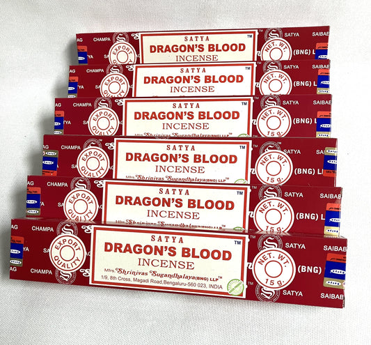 Stack of Satya Dragon's Blood Incense boxes on a white background