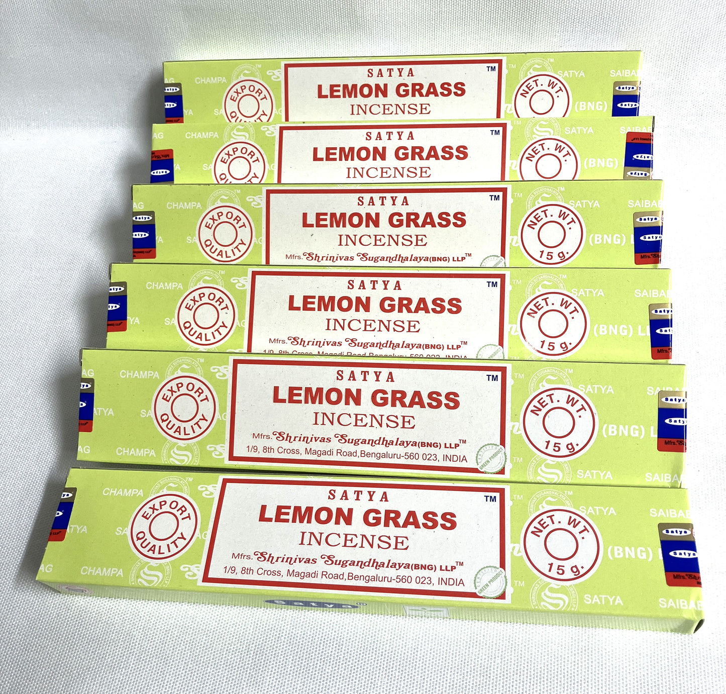 Multiple boxes of Satya Lemon Grass Incense on a light gray background