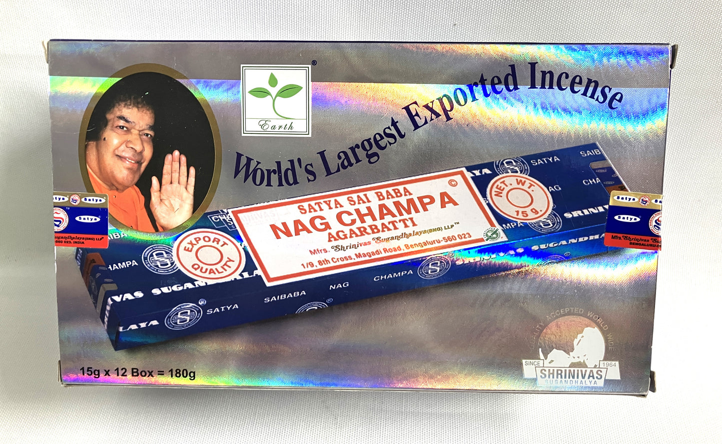 Box of Satya Sai Baba Nag Champa incense with colorful packaging on a white background