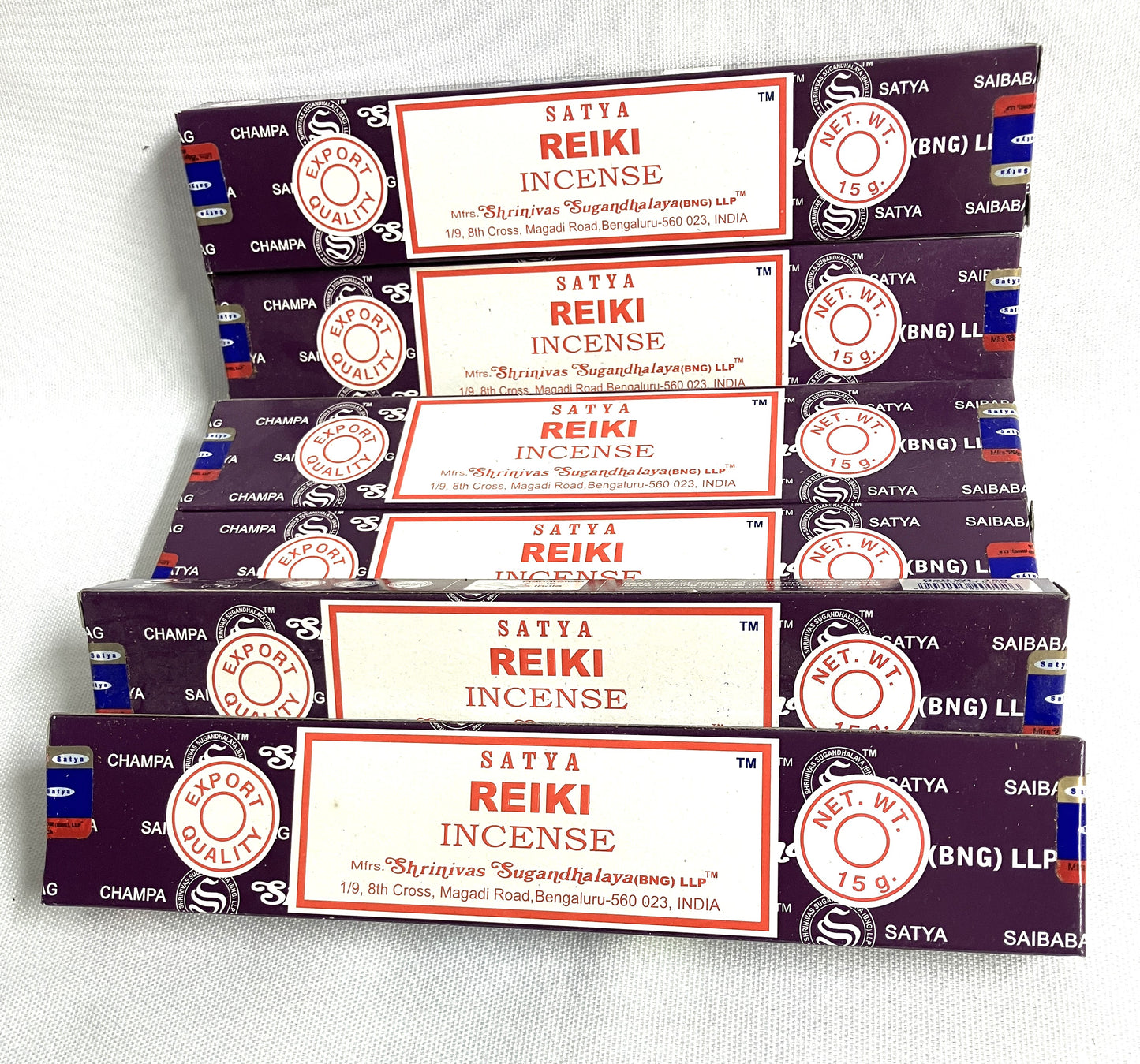 Stack of Satya Reiki Incense boxes on a white background