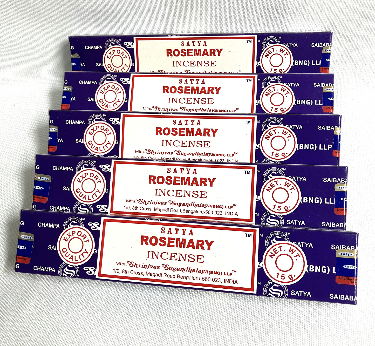 Multiple boxes of Satya Rosemary Incense on a white background