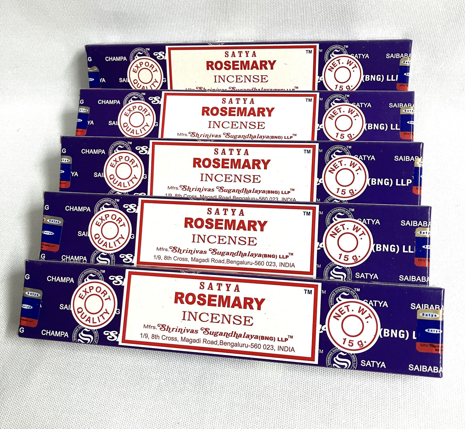 Multiple boxes of Satya Rosemary Incense on a white background