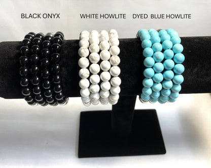 Natural stone and stainless steel beaded stretch bracelet close-up