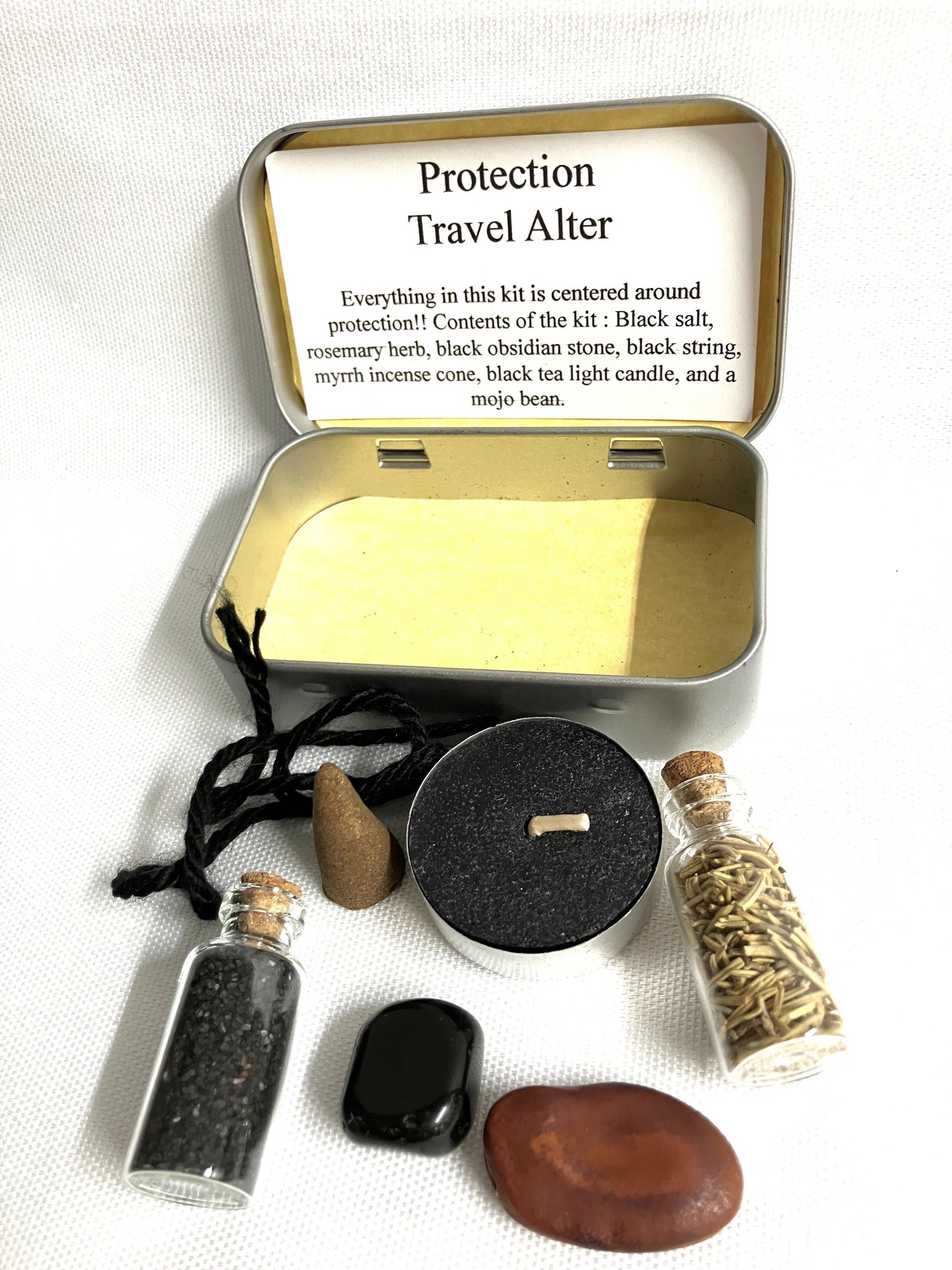 Protection Travel Alter kit with various items on a white background