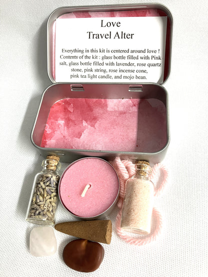 Love Travel alter kit with pink candle, stones, and incense on a white background
