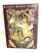 Cover of 'Blood Moon Tarot' by Sam Guay with intricate design and text.