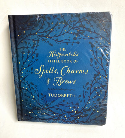 The Hedgewitch's Little Book of Spells Charms and Brews book cover - folk magic and witchcraft guid