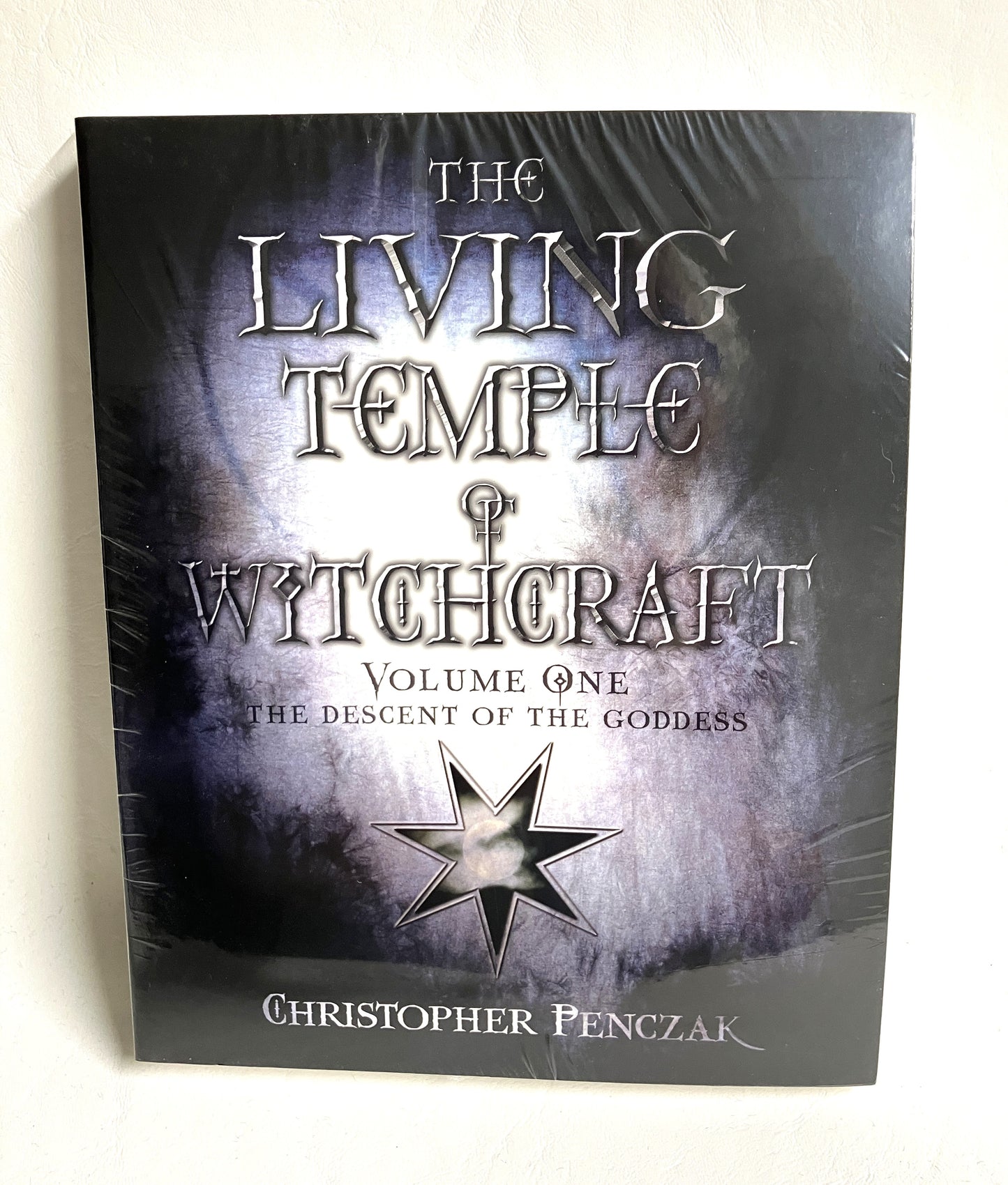 Book titled 'The Living Temple of Witchcraft by Christopher Penczak. Venture into the mysteries of witchcraft and discover within yourself new levels of wisdom, love, power, and responsibility. 