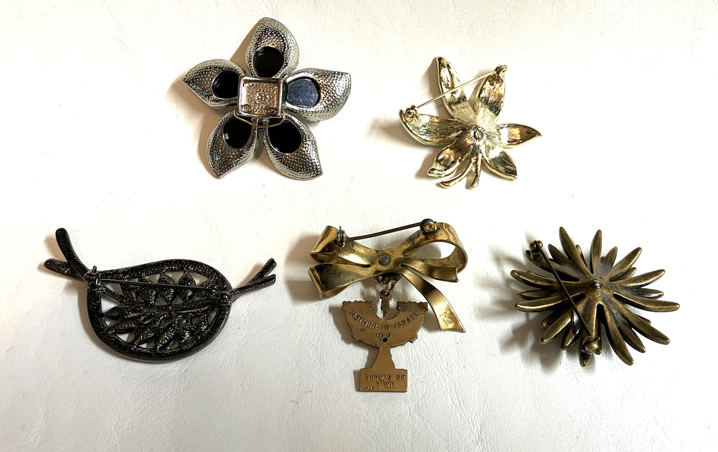 Back side of 5 Vintage Brooches from an Estate Sale