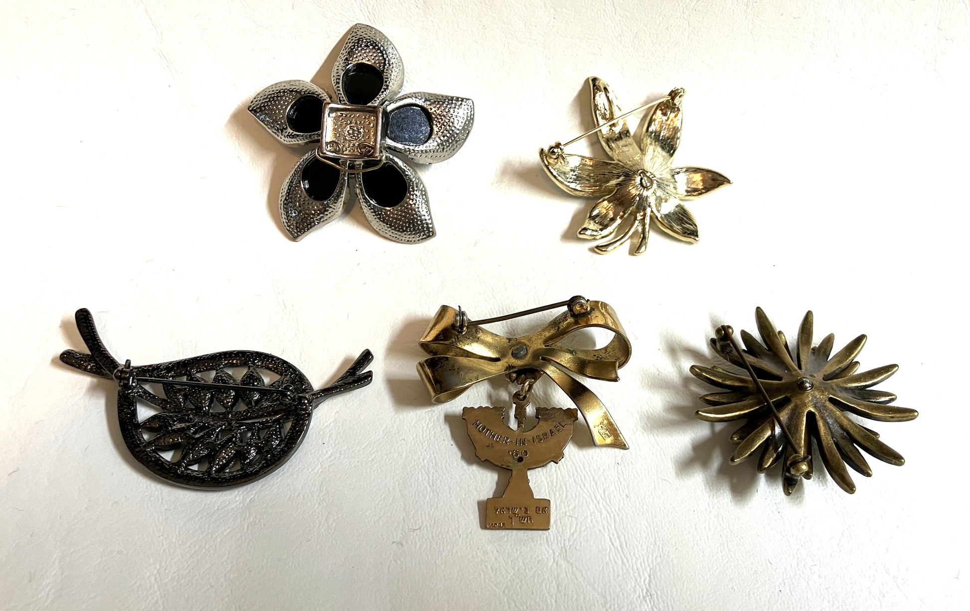 Back side of 5 Vintage Brooches from an Estate Sale