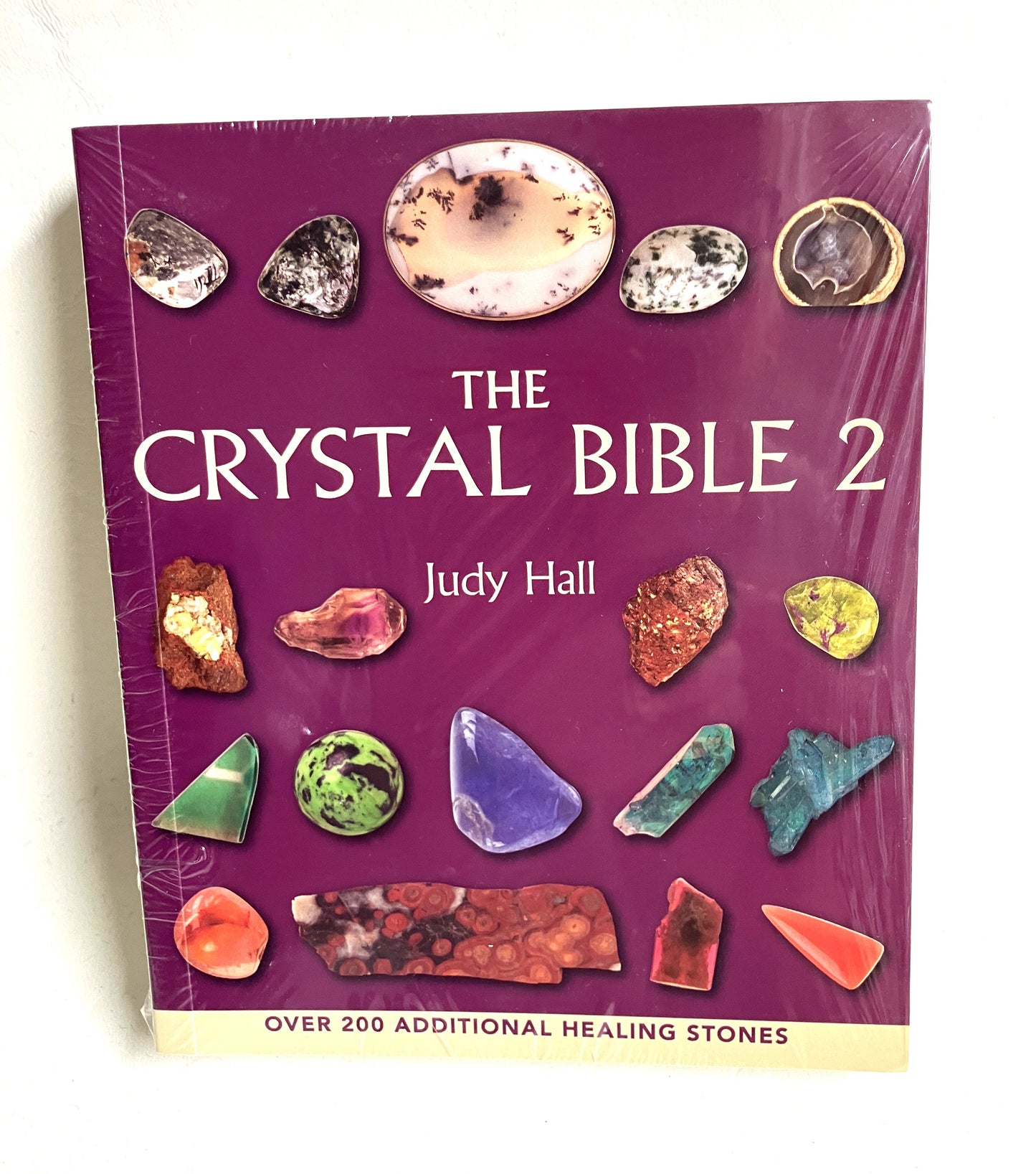 Book titled 'The Crystal Bible 2 by Judy Hall. An indispensable reference for Crystal Lovers.