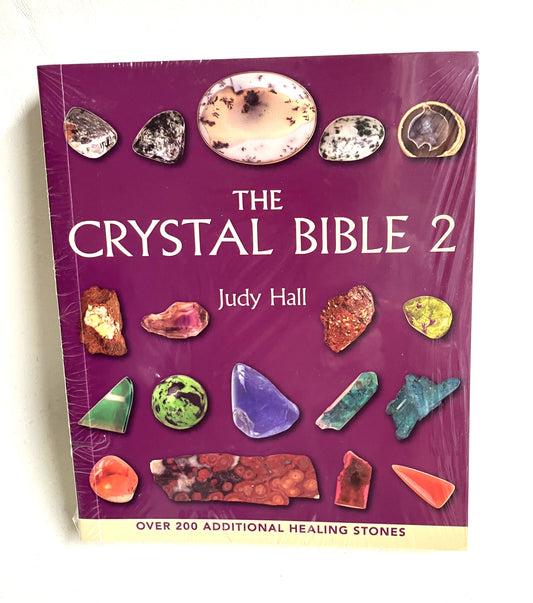 Book titled 'The Crystal Bible 2 by Judy Hall. An indispensable reference for Crystal Lovers.