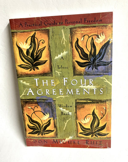 The Four Agreements by Don Miguel Ruiz book cover - personal growth and spiritual wisdom