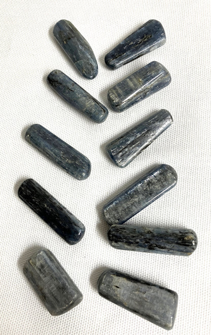 Blue Kyanite Crystals on a white fabric background