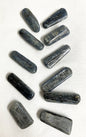 Blue Kyanite Crystals on a white fabric background