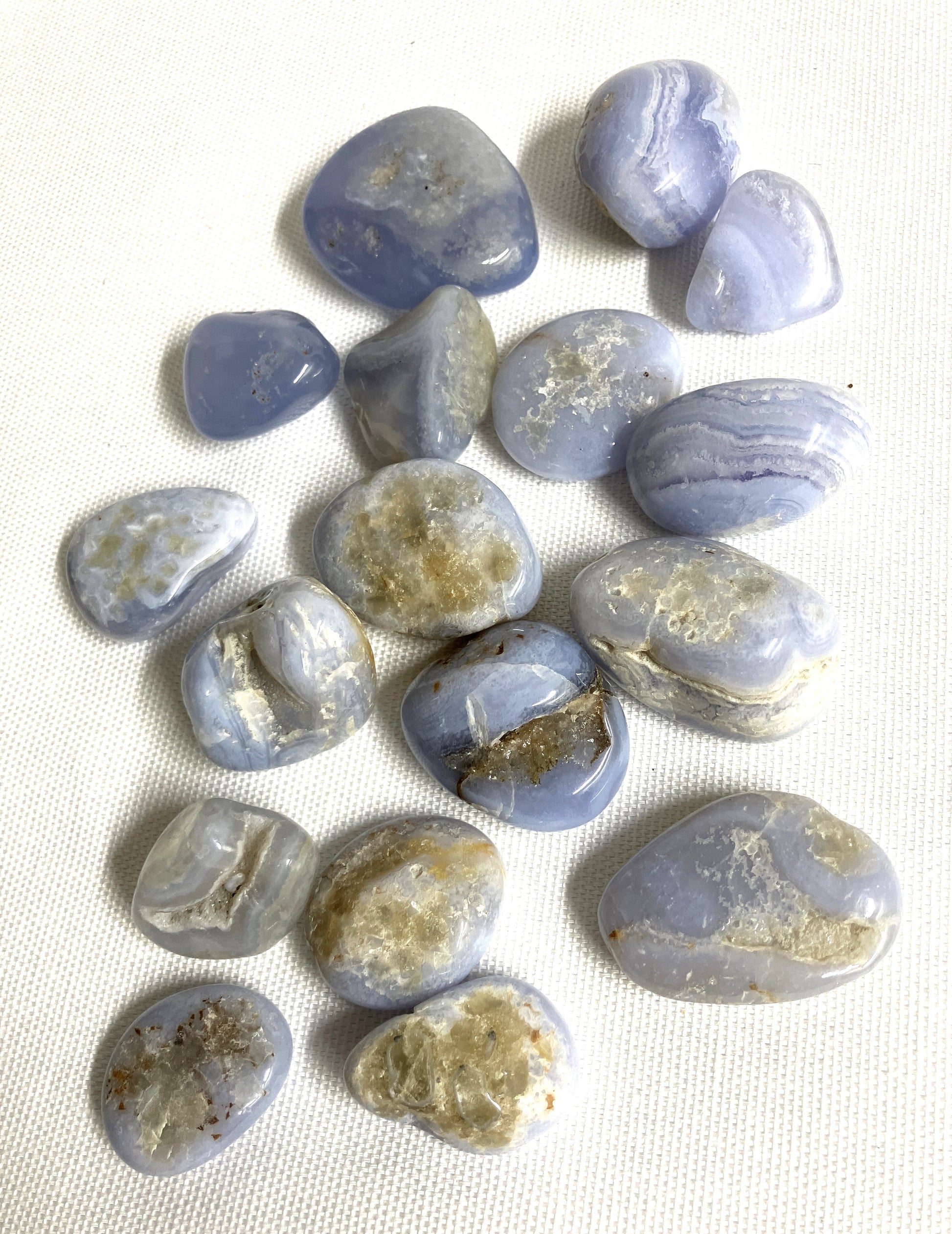 Front side of Blue Lace Agate Crystals on a white background