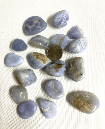 Blue Lace Agate Crystals showing the variations of pattern and color on a white background