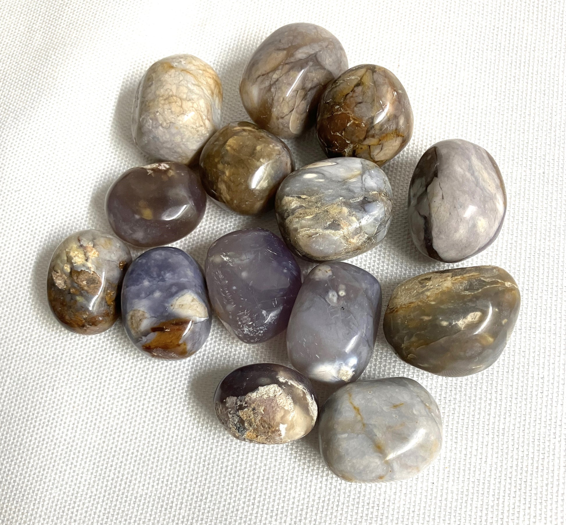 Back view of Purple Chalcedony Crystals on a white fabric background
