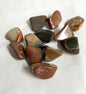 View one of Desert Jasper Crystal AKA Polychrome Jasper on a white fabric background
