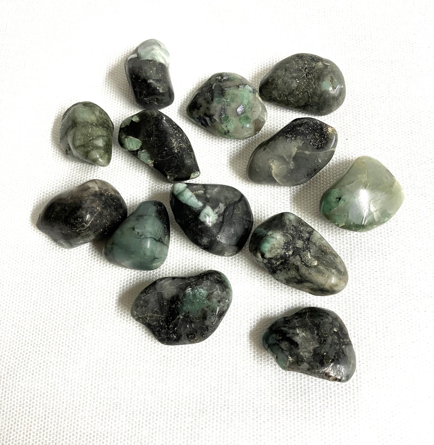 Collection of Emerald Crystals on a white background