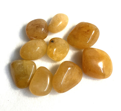 Golden Azeztulite Crystals sowing the reverse side  on a white background