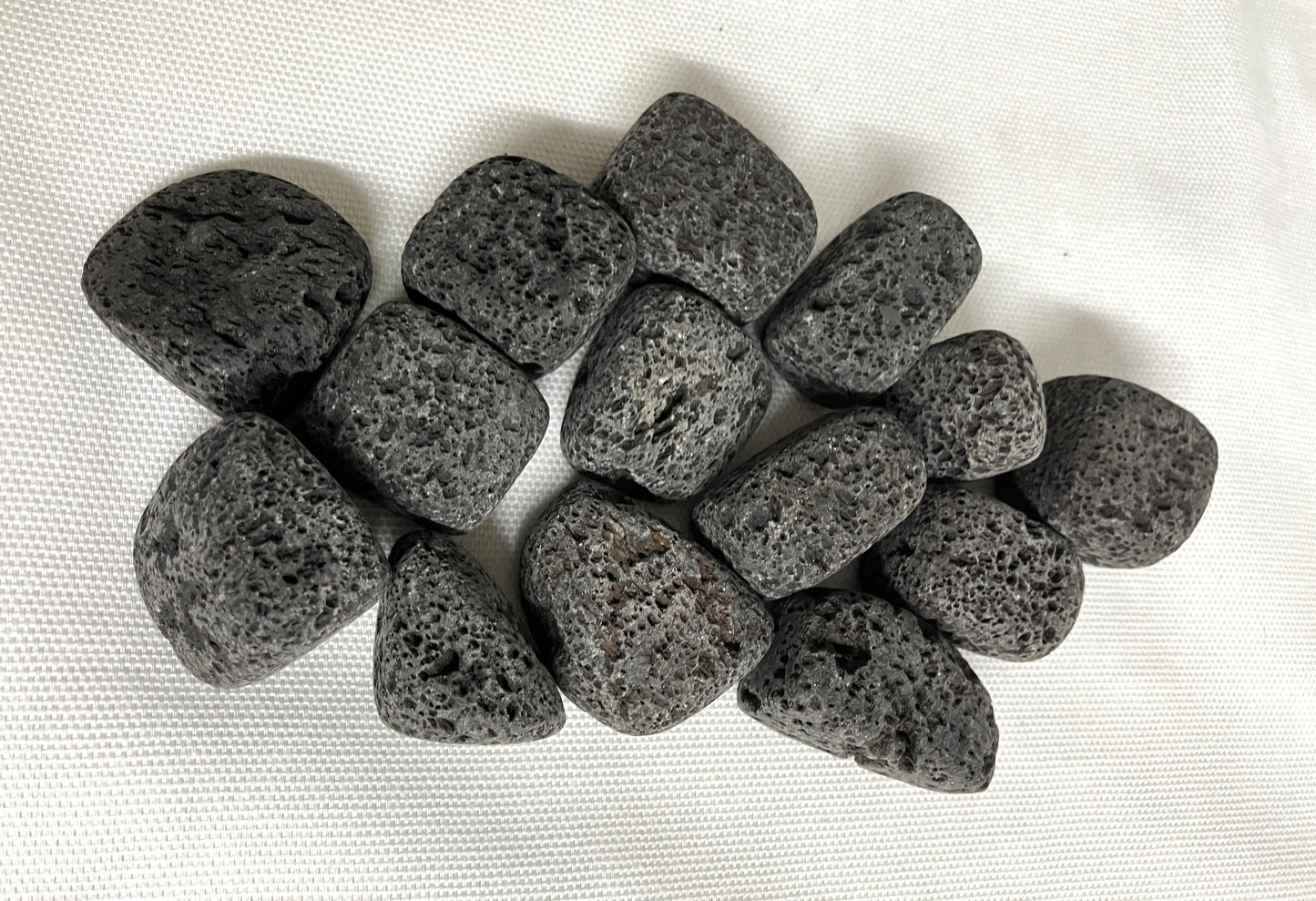 Group of Lava Stones showing the texture on a white background