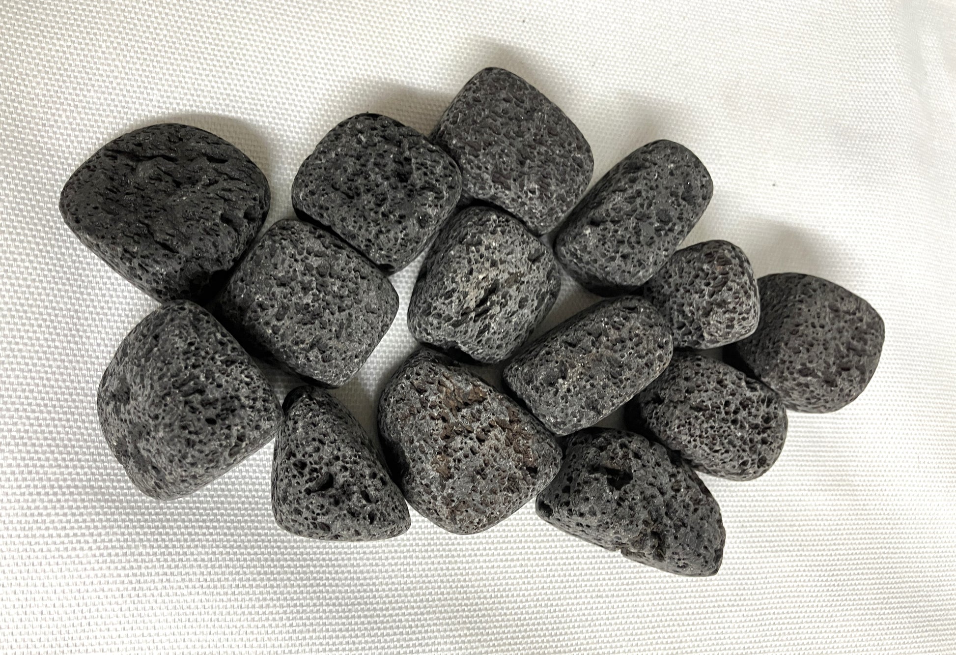 Group of Lava Stones showing the texture on a white background