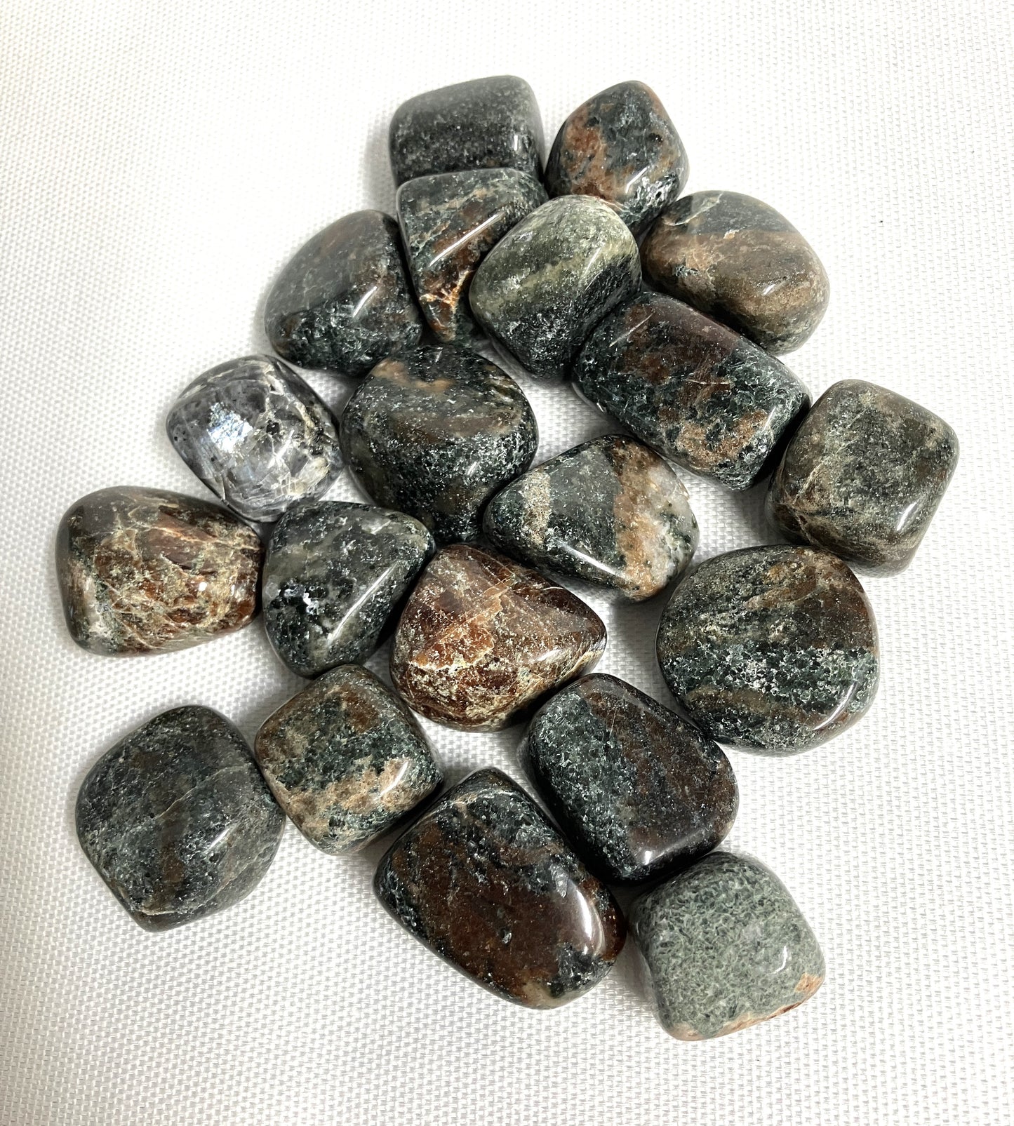 Back view of Green Garnet Crystals on a white background