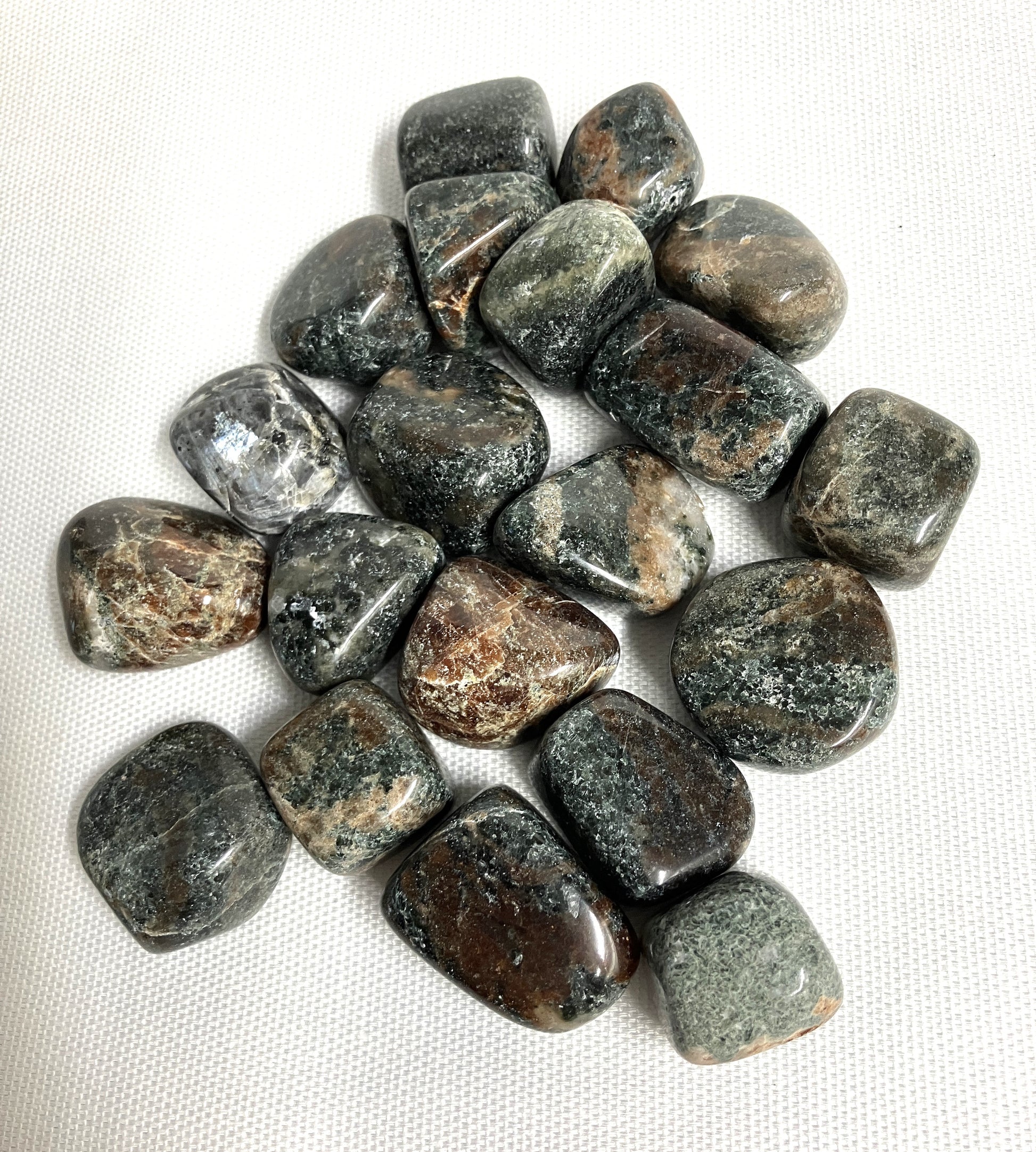 Back view of Green Garnet Crystals on a white background