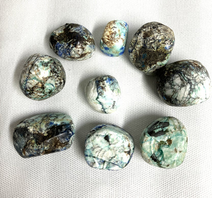 Back view of Azurite and Malachite Crystals on a white fabric background