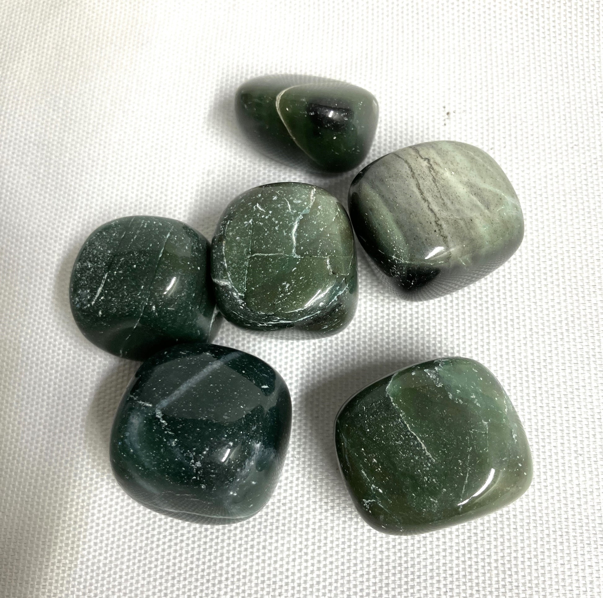 Closeup of Bowenite tumbled crystals