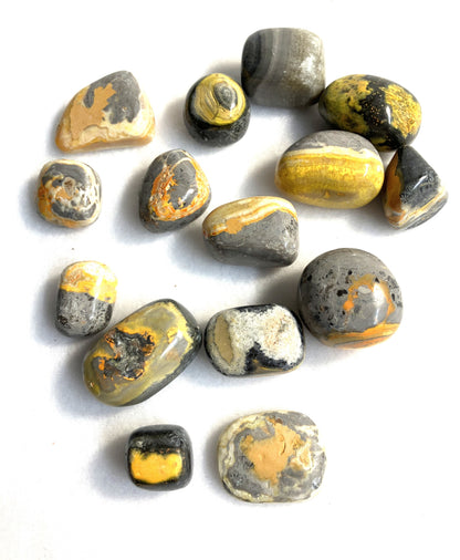 Reverse side of Bumblebee Jasper Crystals shown on a white background
