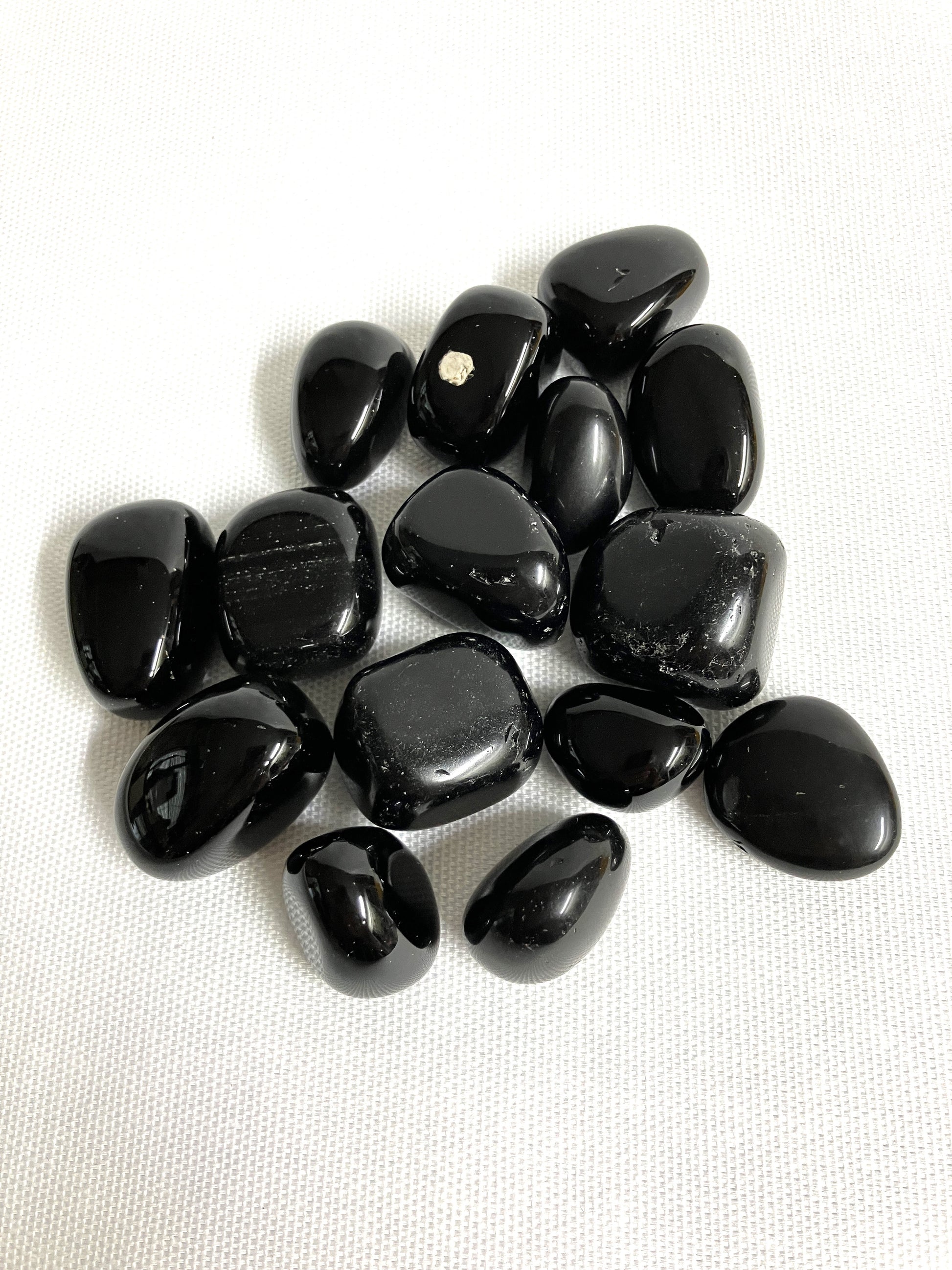 Bottom view of Black Obsidian Crystals on a white background